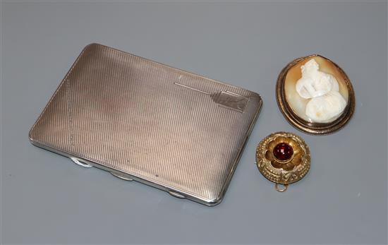 A silver presentation cigarette case (modified for use as a photograph frame), a gilt metal mourning brooch and a cameo brooch